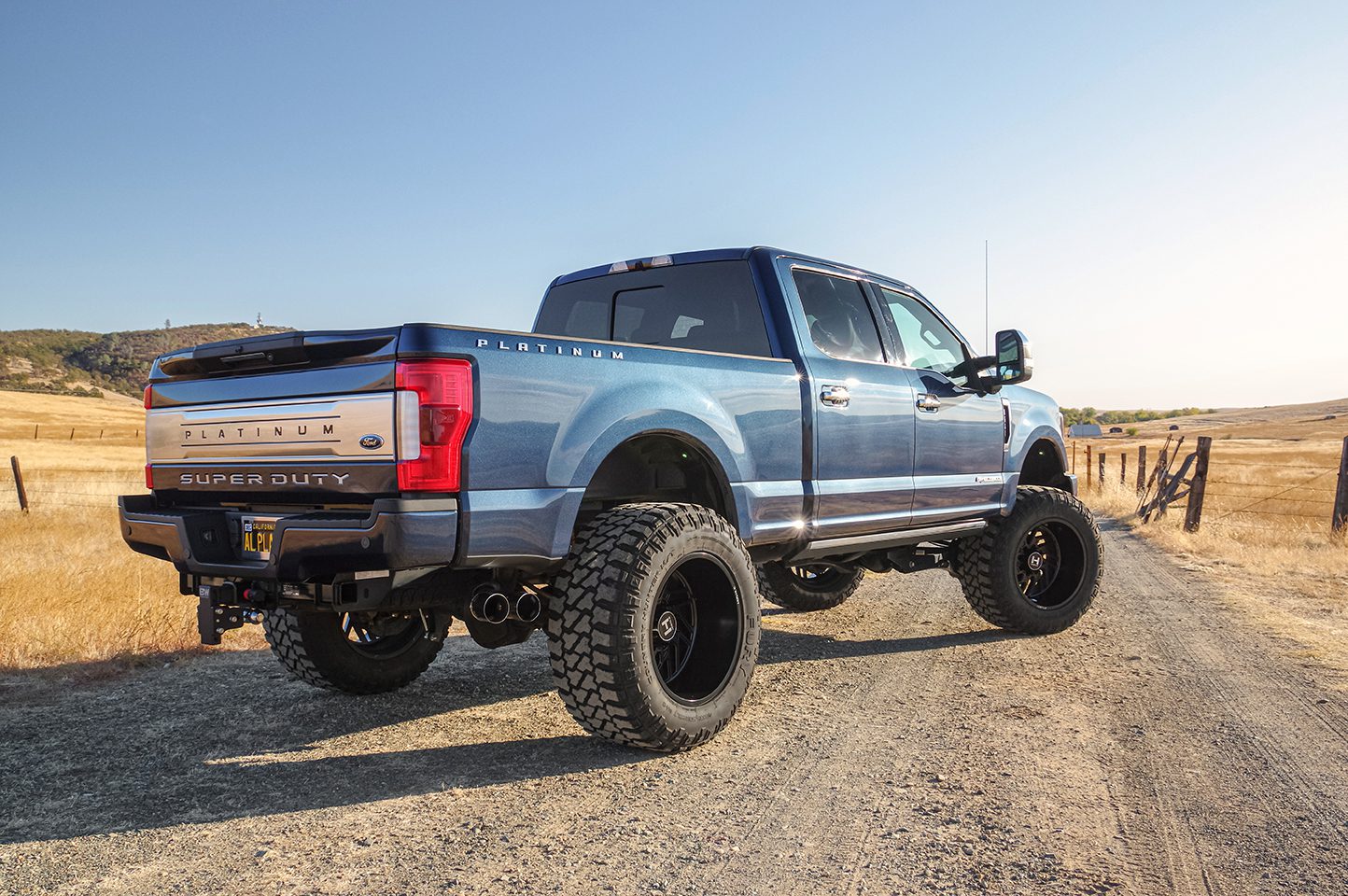 2022 F 250 Platinum Super Duty blue pickup truck