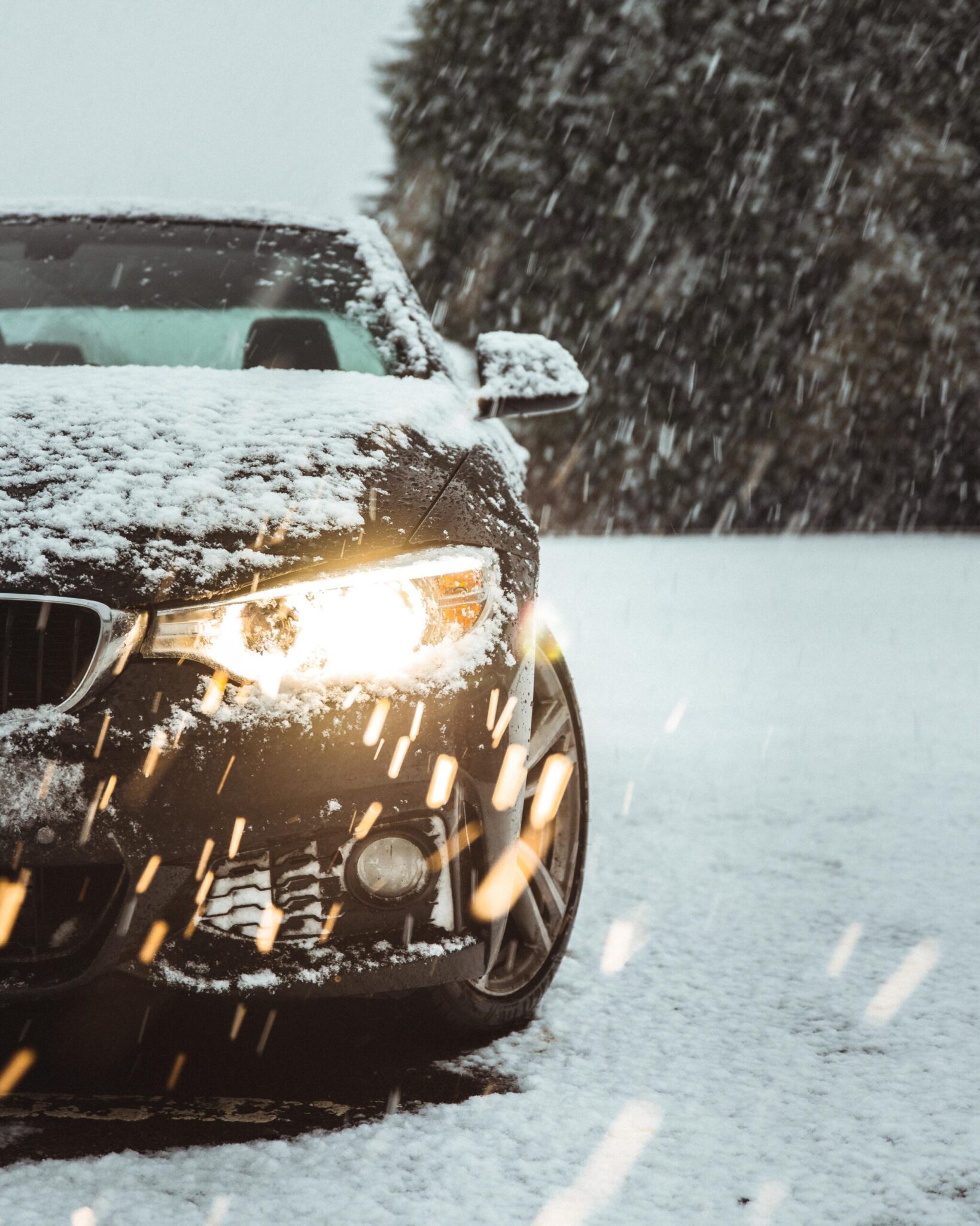 Car in snow with Goodyear Winter tire